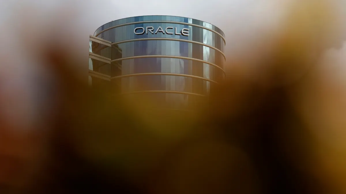 The Oracle logo is displayed on a building at an Oracle campus on September 10, 2025 in Redwood Shores, California.
