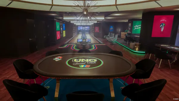A hotel suite with Uno-themed decor. A game table is featured prominently in the foreground.