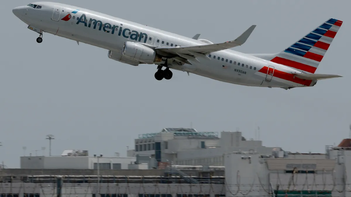 An American Airlines plane takes off from the Miami International Airport on July 20, 2023 in Miami, Florida.