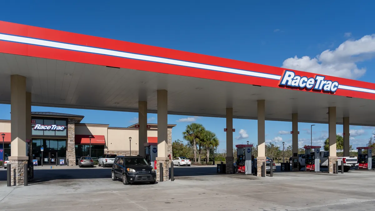 an overview of a racetrac gas station featuring company signage on a sunny day