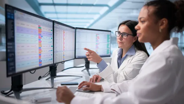 Female Doctor Analyzing Medical Data