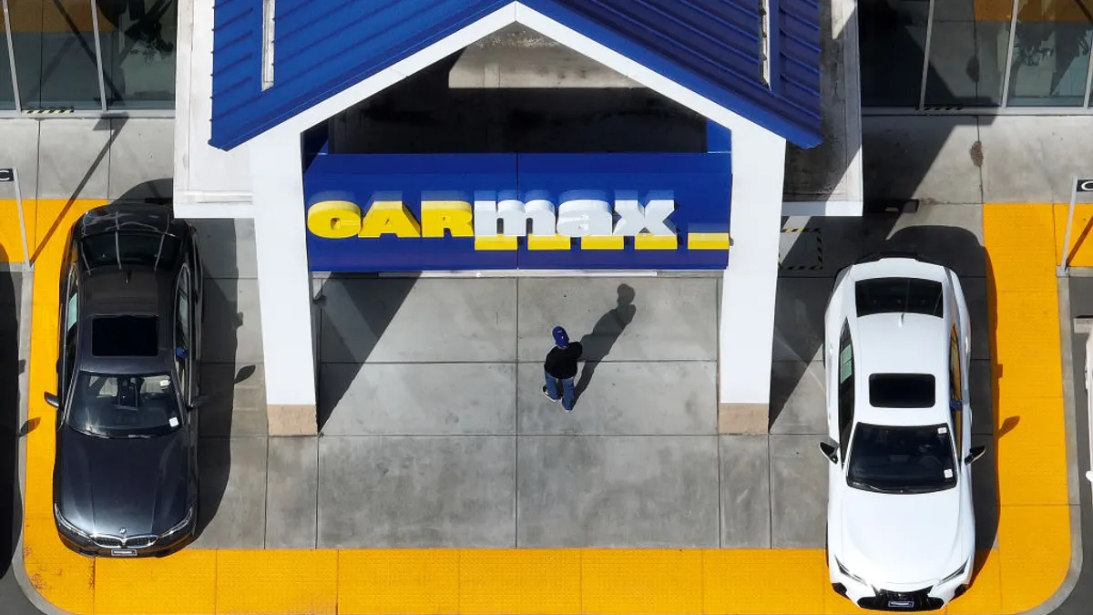 Customer walking into CarMax store in Santa Rosa, Calif.