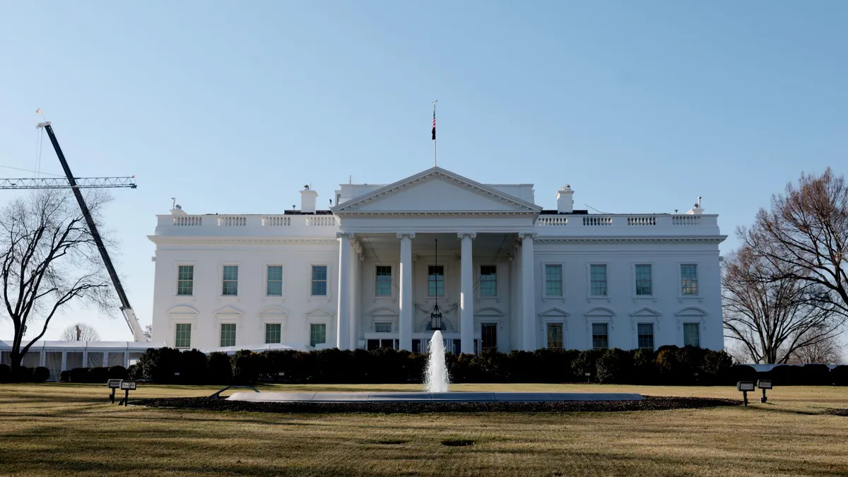 The White House exterior with a construction crane on the left.