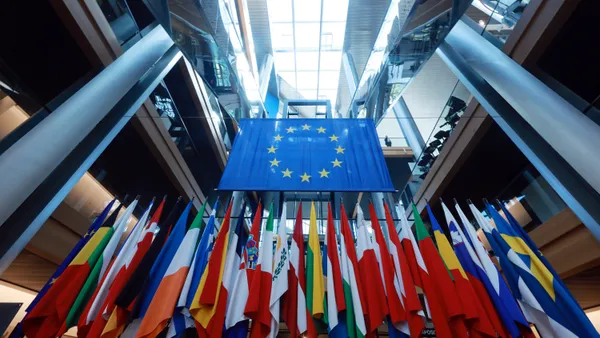 Flags of member states of the European Union stand in an atrium of the European Parliament building on May 21, 2024 in Strasbourg, France.