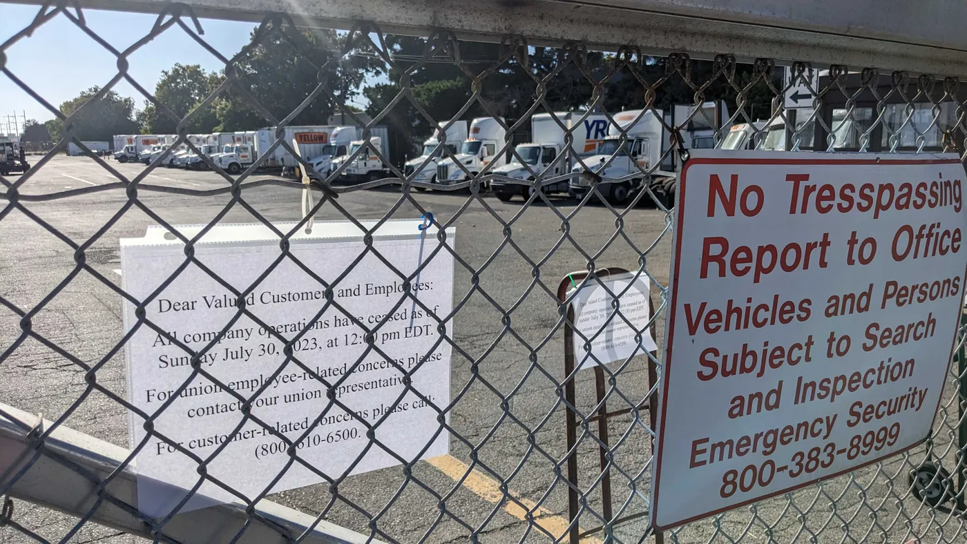 Yellow posted four signs announcing operations had ceased at the gate of its Hayward, California terminal.