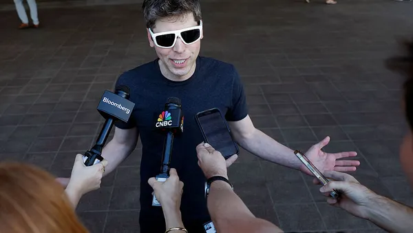 OpenAI CEO Sam Altman speaks to members of the media