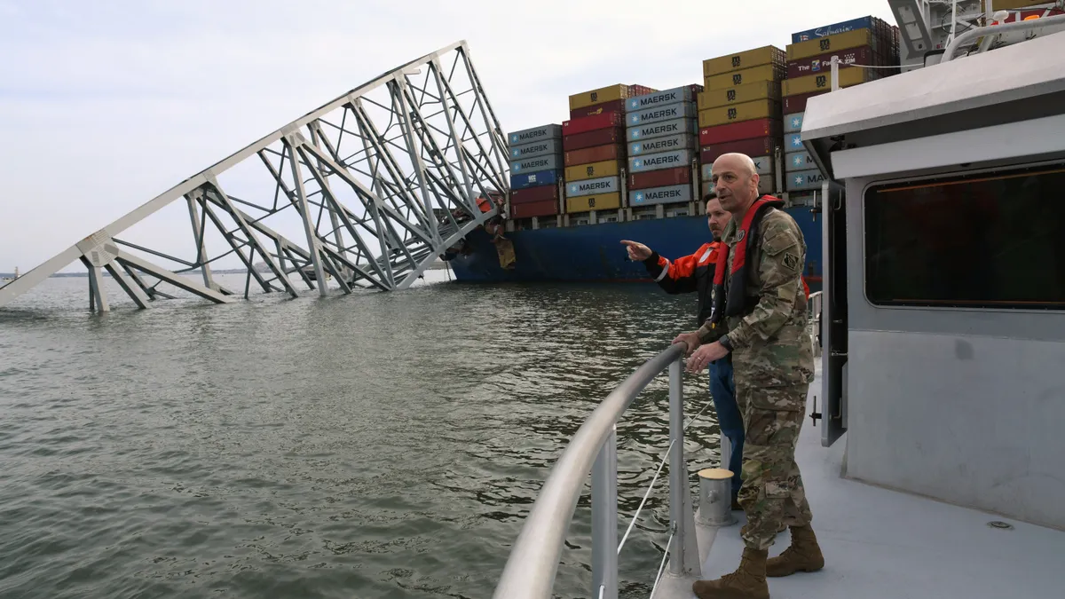 A commanding general views the fallen Francis Scott Key Bridge.