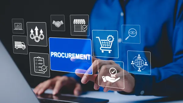 Procurement icons related to logistics, supply chain, and inventory management float above hands typing on a laptop.