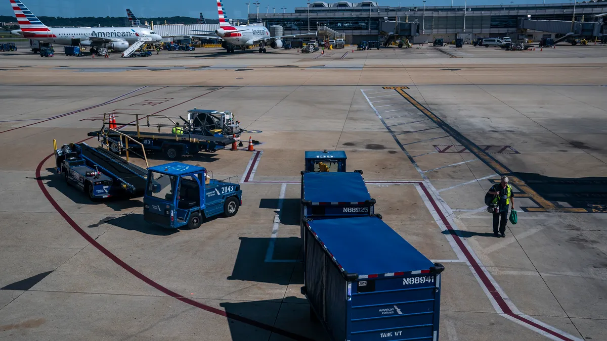 Commercial jets line up at passenger gates at Ronald Regan Washington National Airport on July 11, 2022 in Arlington, Virginia.