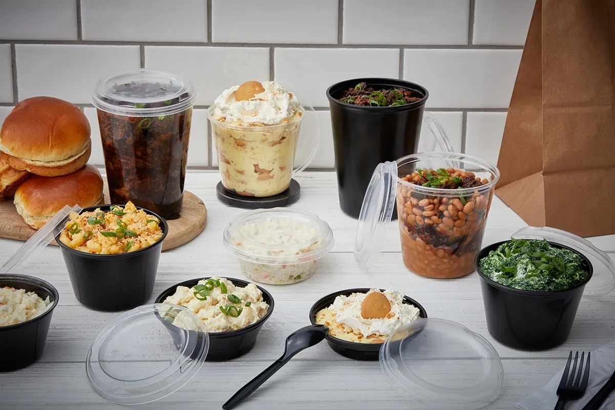 Various sizes and shapes of plastic containers with food inside.