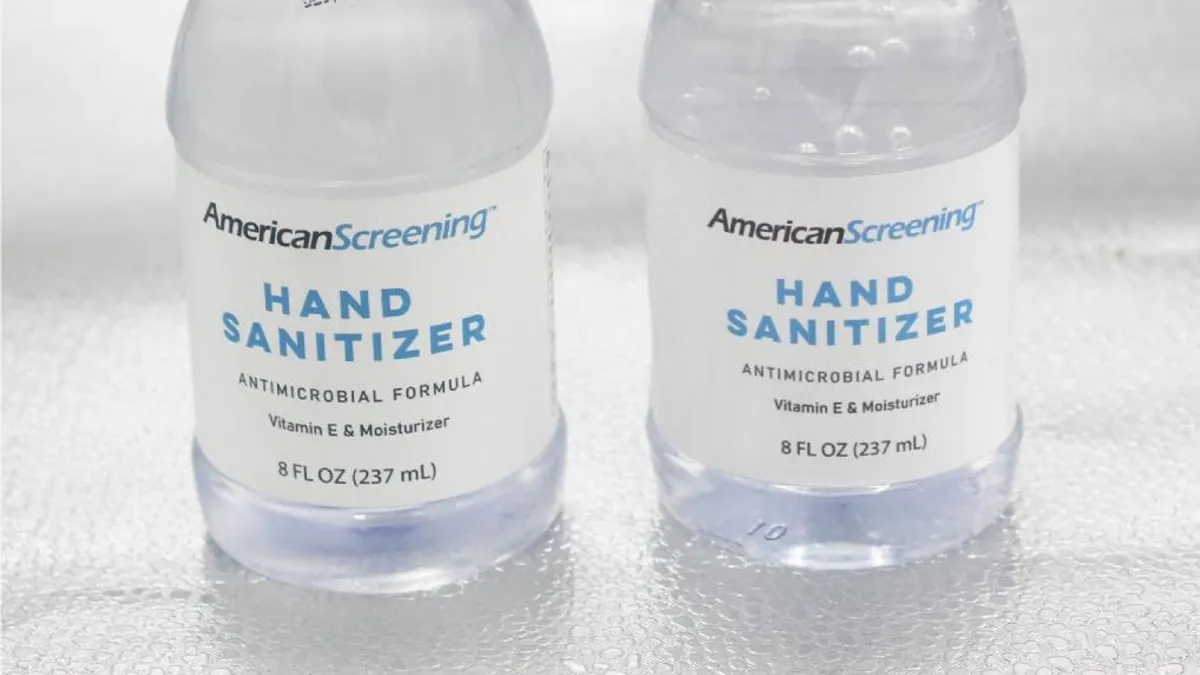 American Screening logo on two hair sanitizer bottles.