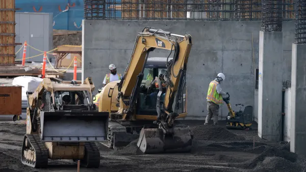 Construction laborers work in San Francisco