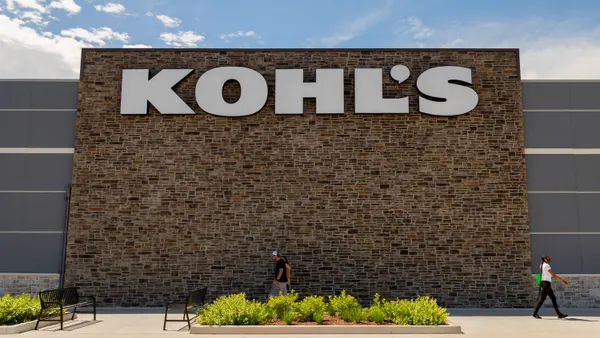 Pedestrians walk outside a Kohl’s store location.