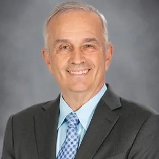 A head and shoulders photo of a person.