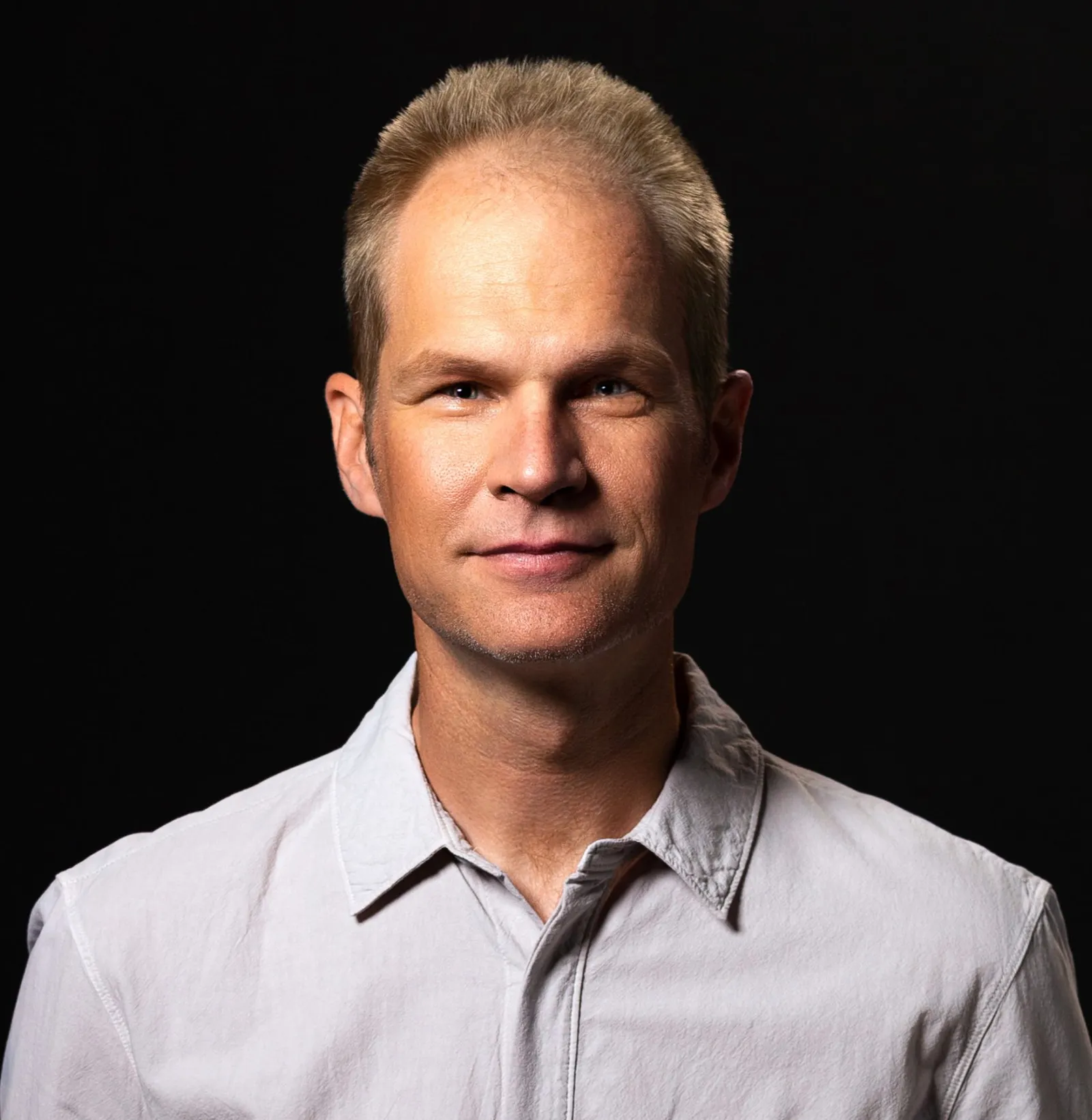 Headshot of Rob Beard, Mastercard's chief legal officer