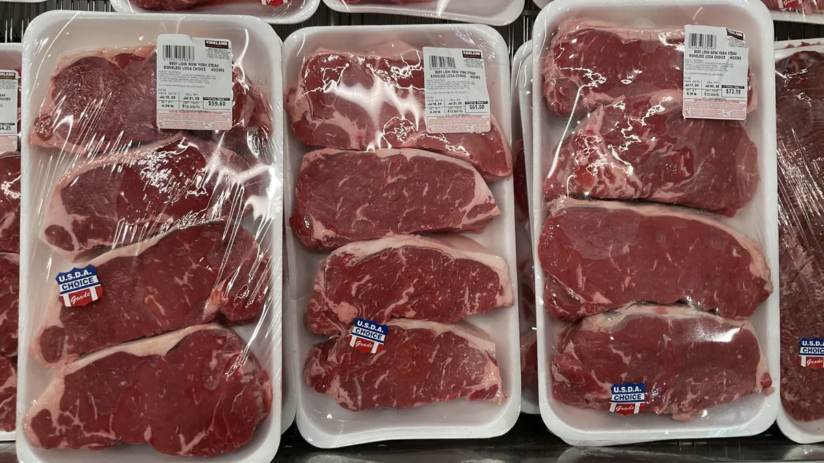 Packages of meat in a grocery store.