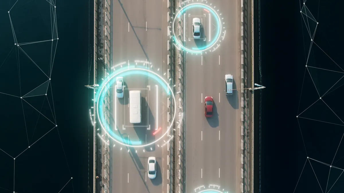 Aerial view of self driving autopilot cars driving on a highway.