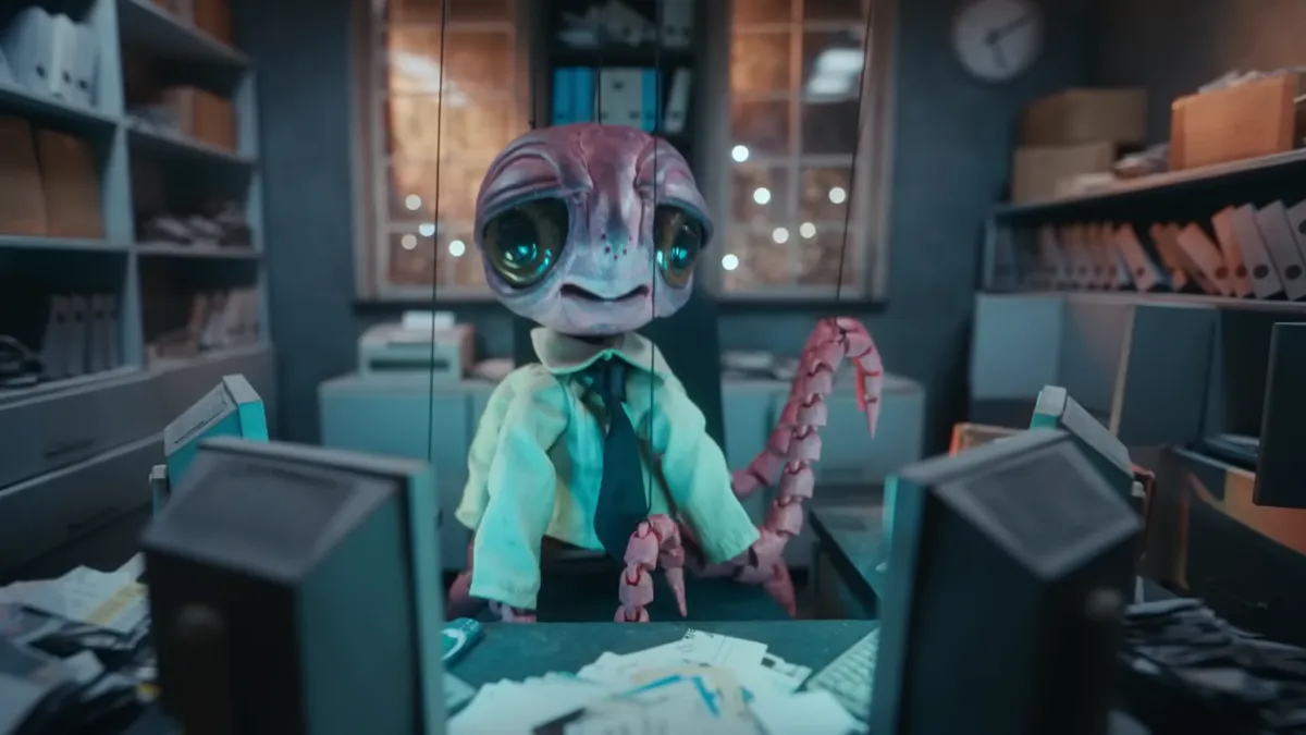 An octopus marionette appears in a Squarespace ad