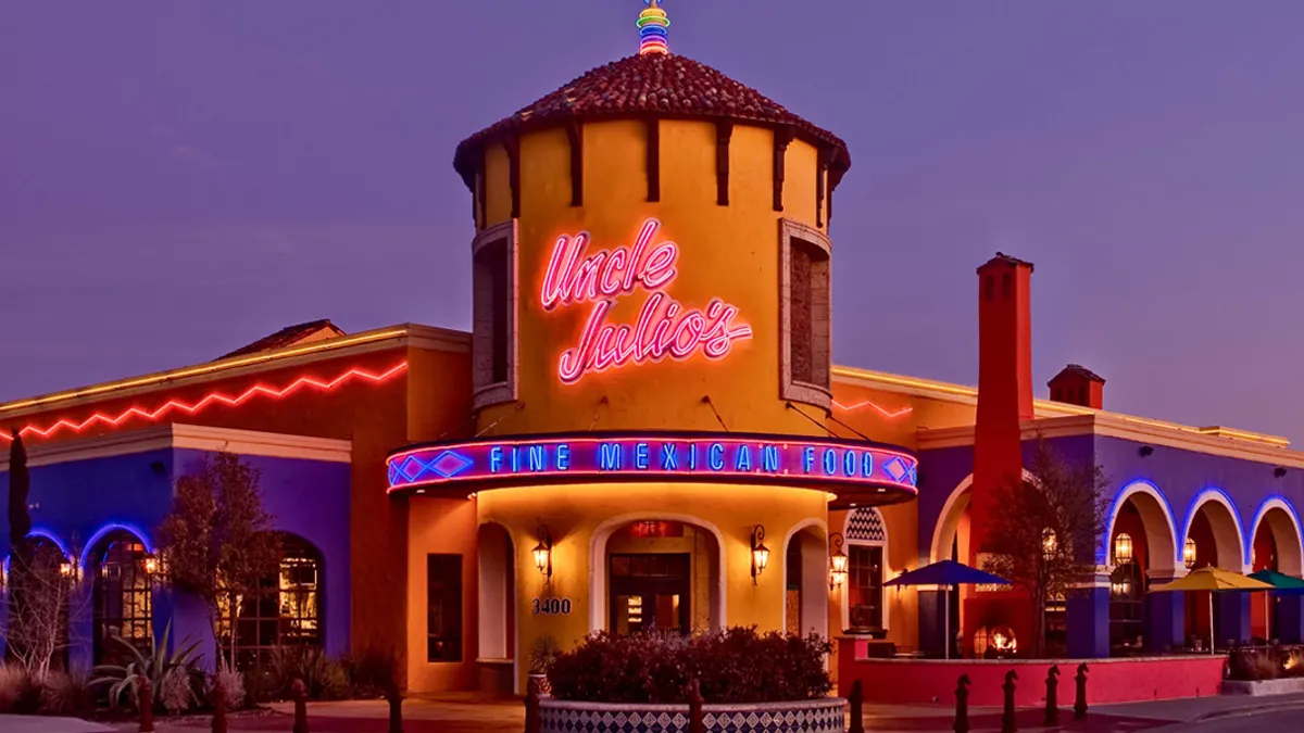 An evening photo of Uncle Julio's restaurant with dim lighting