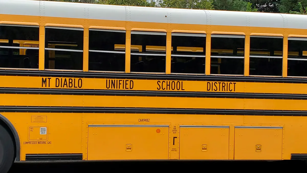 A yellow school bus with "mt diablo unified school district" written on the side.