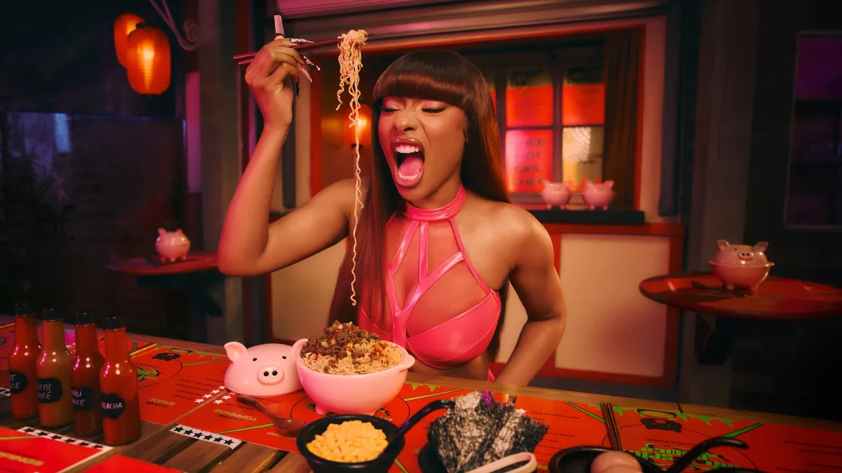 Megan Thee Stallion eats ramen in an Airbnb campaign