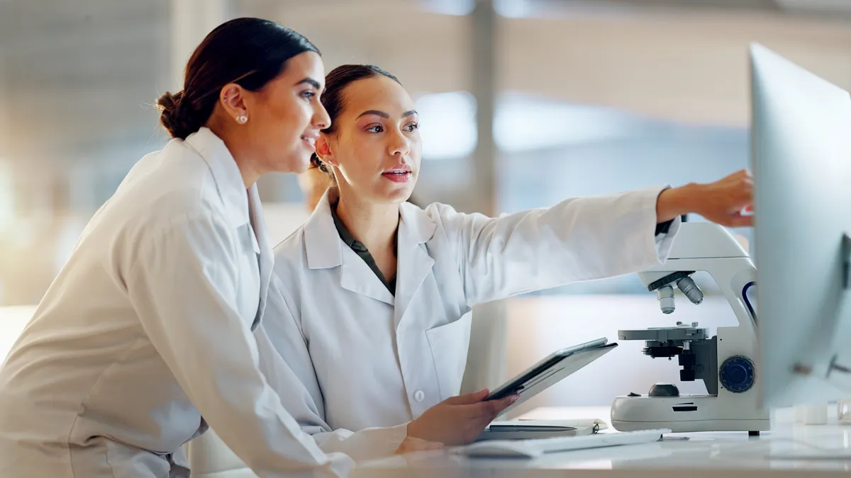 Scientists and teamwork on tablet and computer for laboratory advice, medical research and night planning.