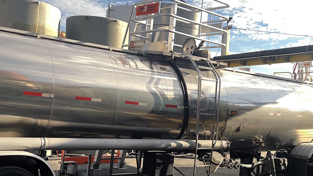 A tanker truck with a ladder on the side that driver Viktor Voloshin used to climb to the top. He died after inhaling toxic fumes inside the trailer.