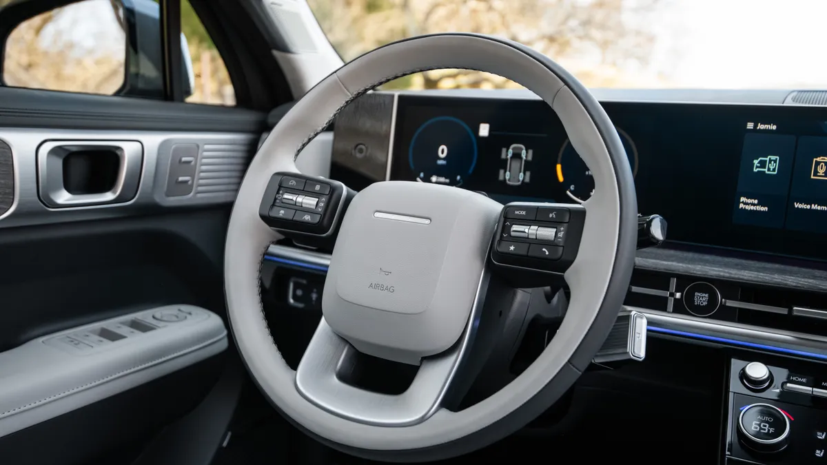 The steering wheel of the 2025 Hyundai Santa Fe.