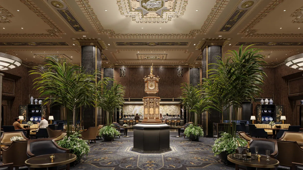 The lobby of the hotel features a golden clock.