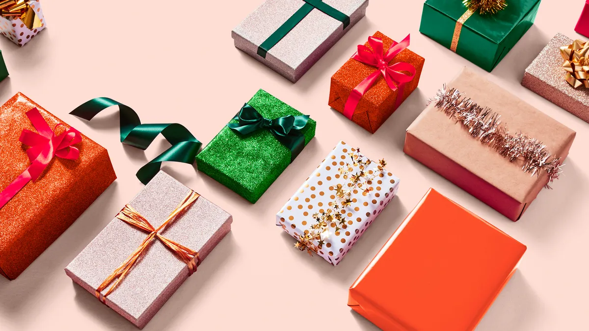 A collection of holiday-wrapped boxes of various sizes.