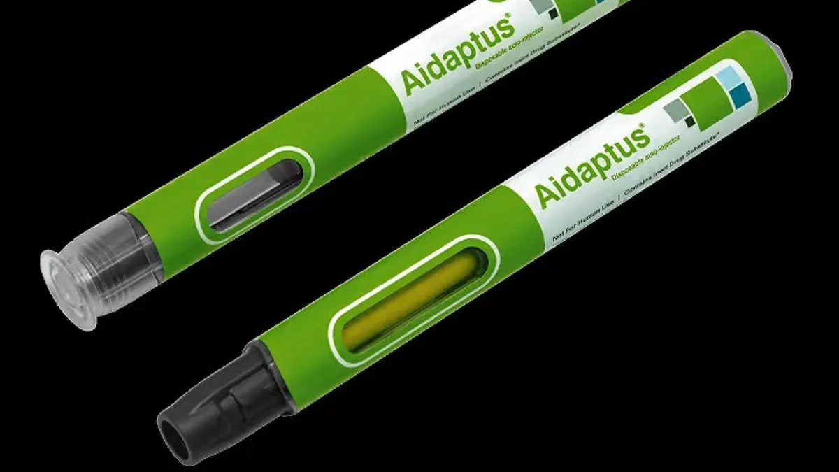Two green pens side by side