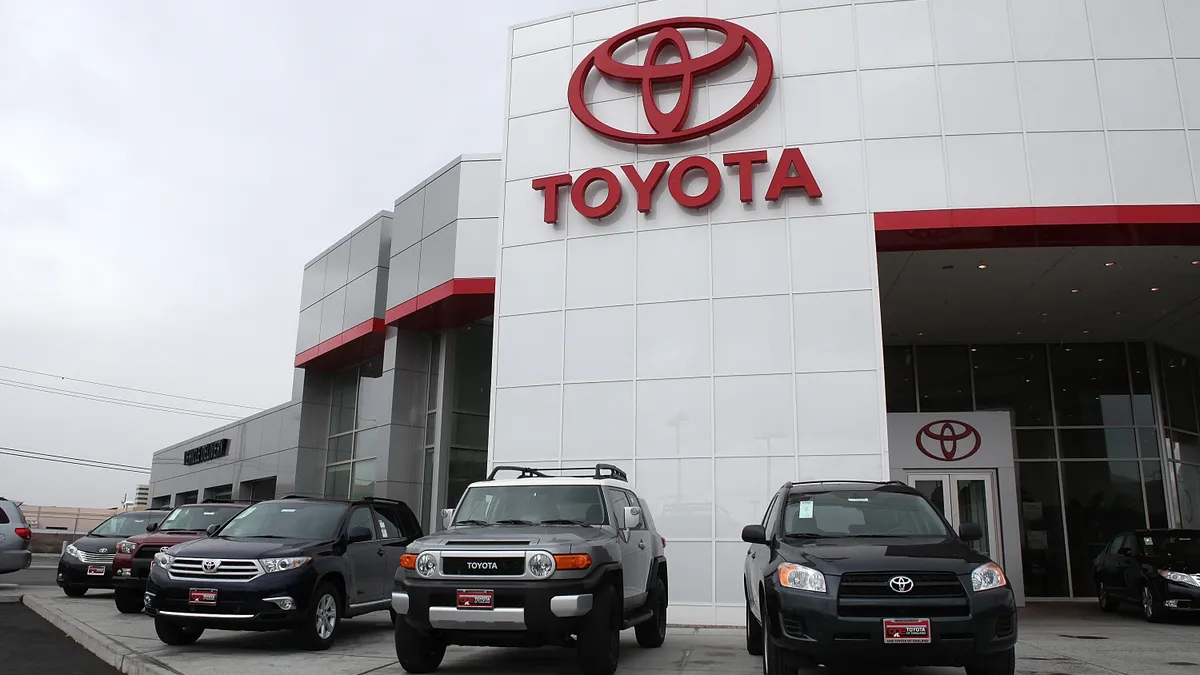 Toyota vehicles displayed at a Toyota dealership.