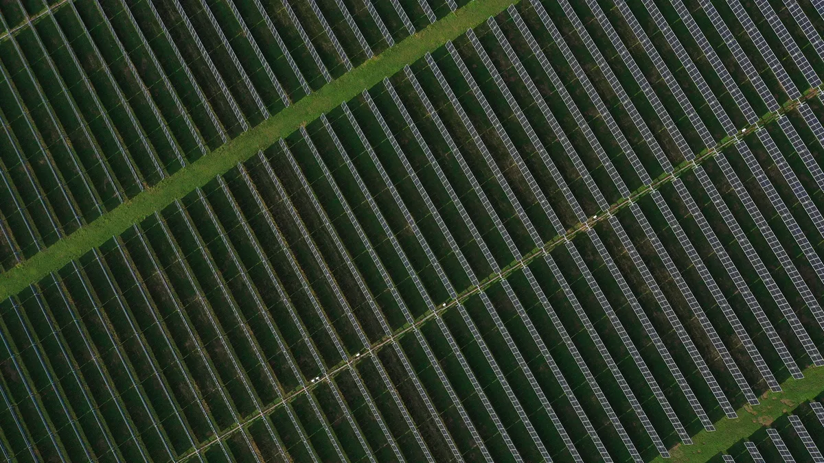 In an aerial view, the Amazon Fort Powhatan Solar Farm is seen on August 19, 2022 in Disputanta, Virginia.