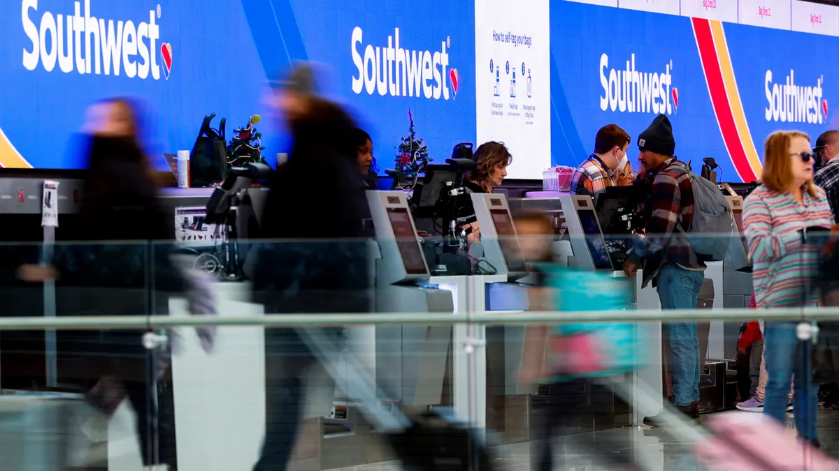 Customers check in for Southwest flights with their bags.