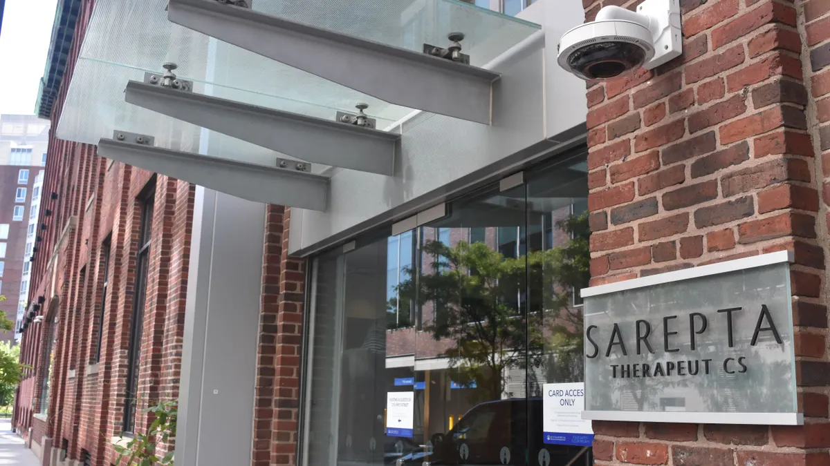 A Sarepta logo is displayed on a building in Cambridge, Massachusetts on Sept. 5, 2024.