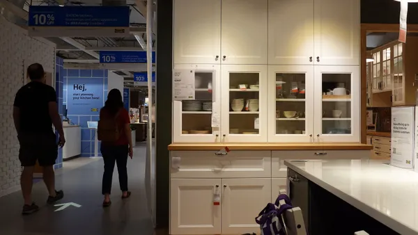 People walk by a kitchen cabinet display at an Ikea store on Sept. 26, 2025, in Emeryville, California.