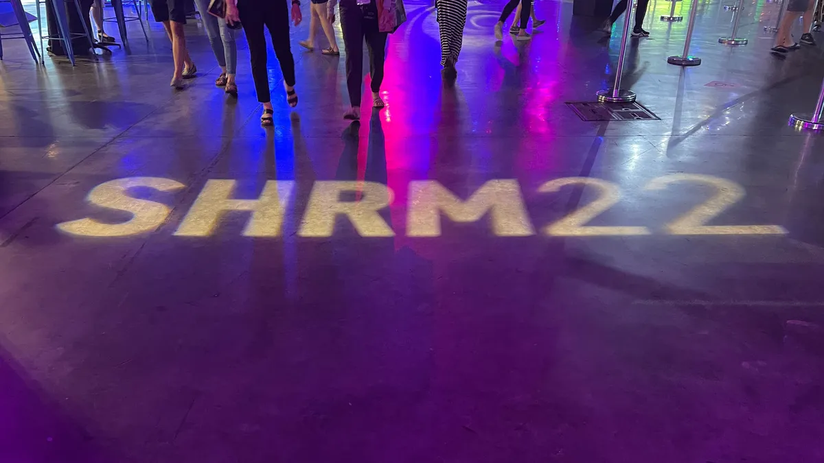 Light on the floor spells out SHRM 22.