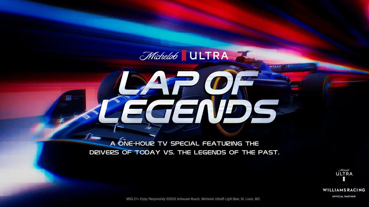 A race car serves as a backdrop in a "Laps of Legends" promotion photo.