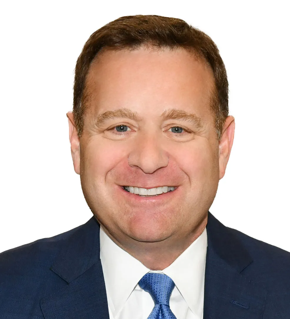 A head and shoulders shot of a person against a white background.