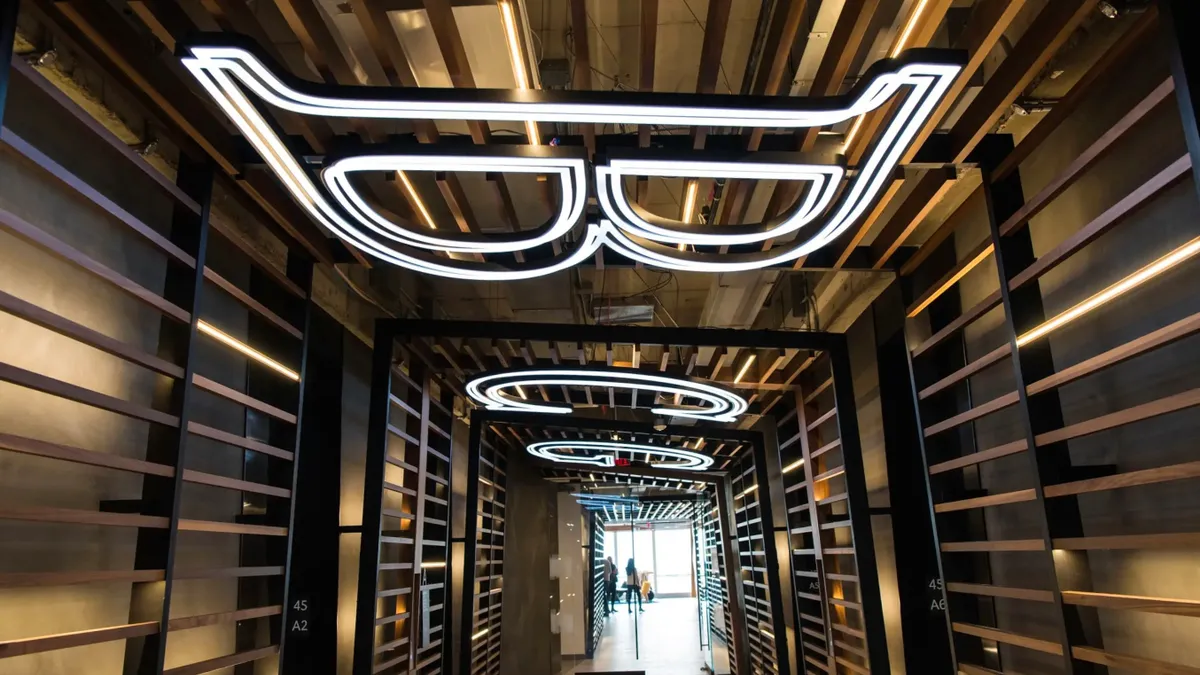 A picture of the ceiling at Boston Consulting Group's office, displaying its logo.