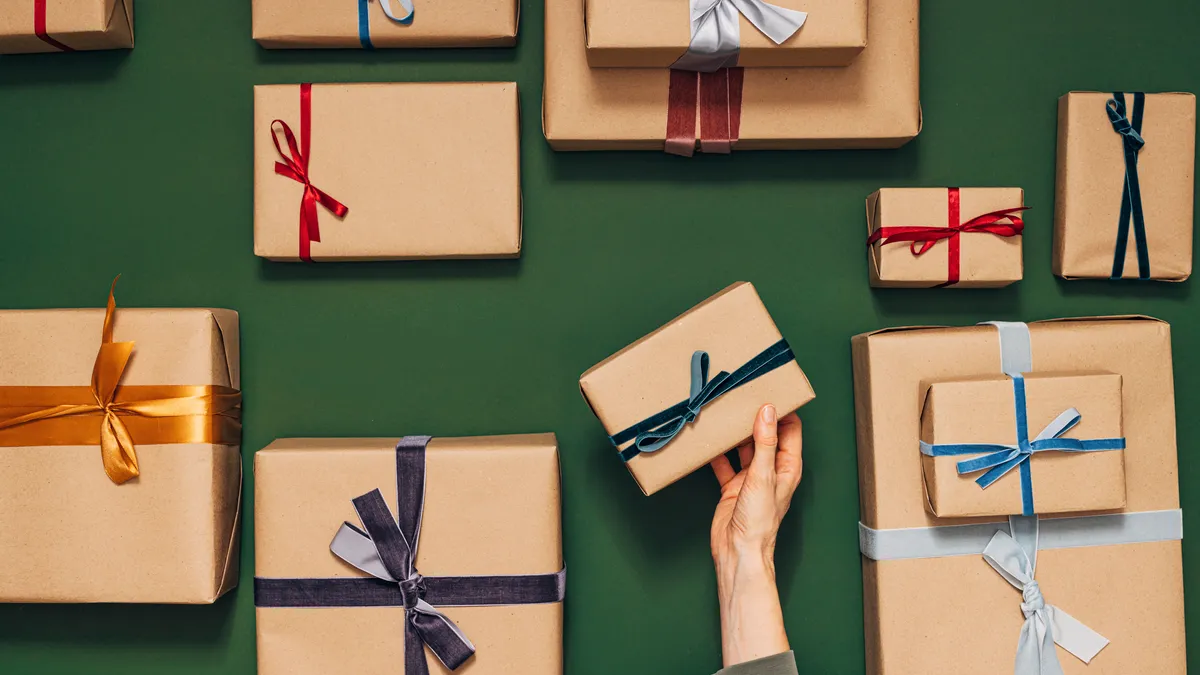 Many wrapped presents on a green background