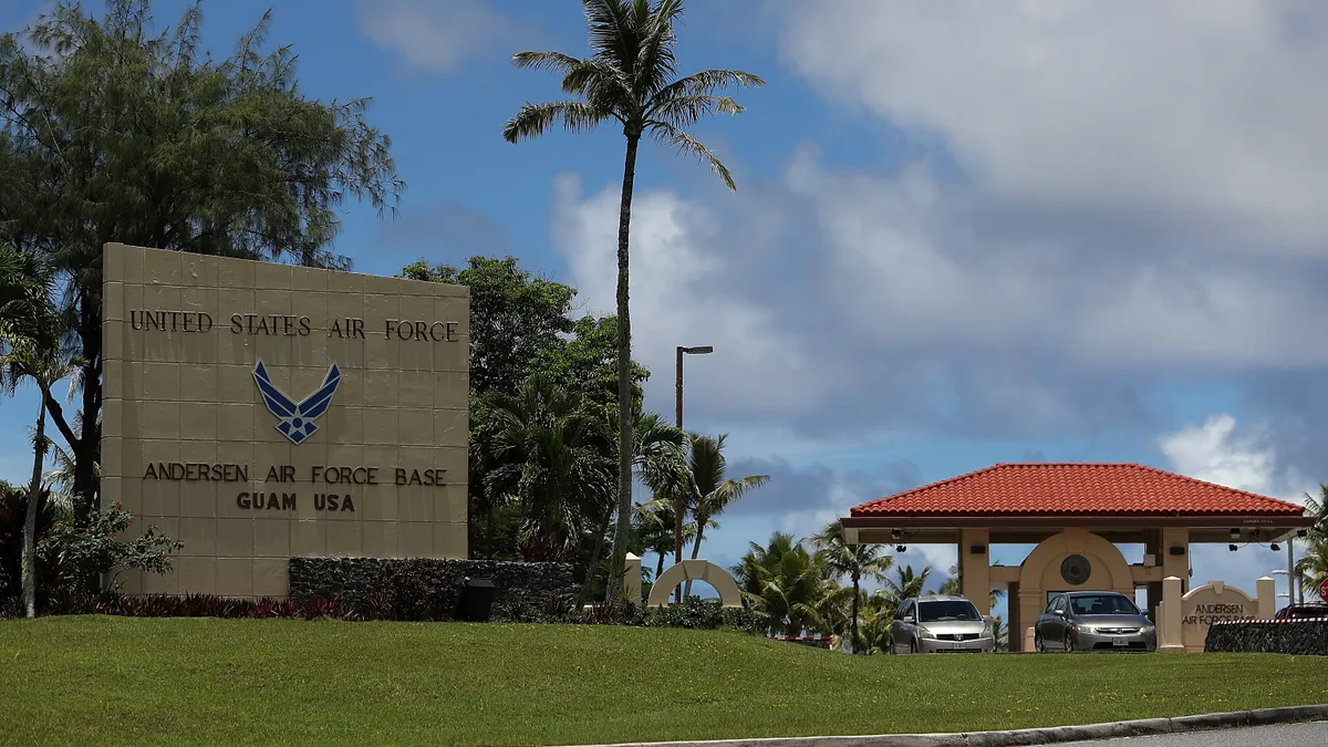 A sign and guard post are pictured on the Andersen Air Force Base in Guam.