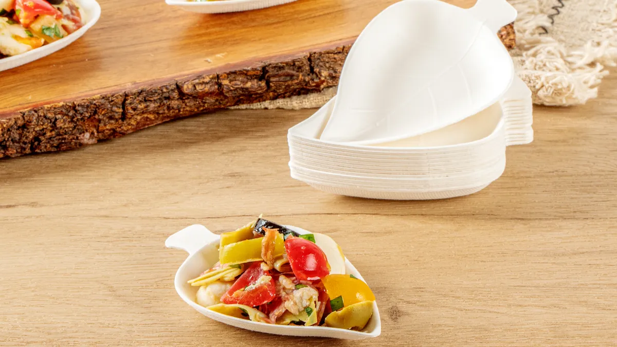 Restaurantware's leaf-shaped bagasse tasting dish