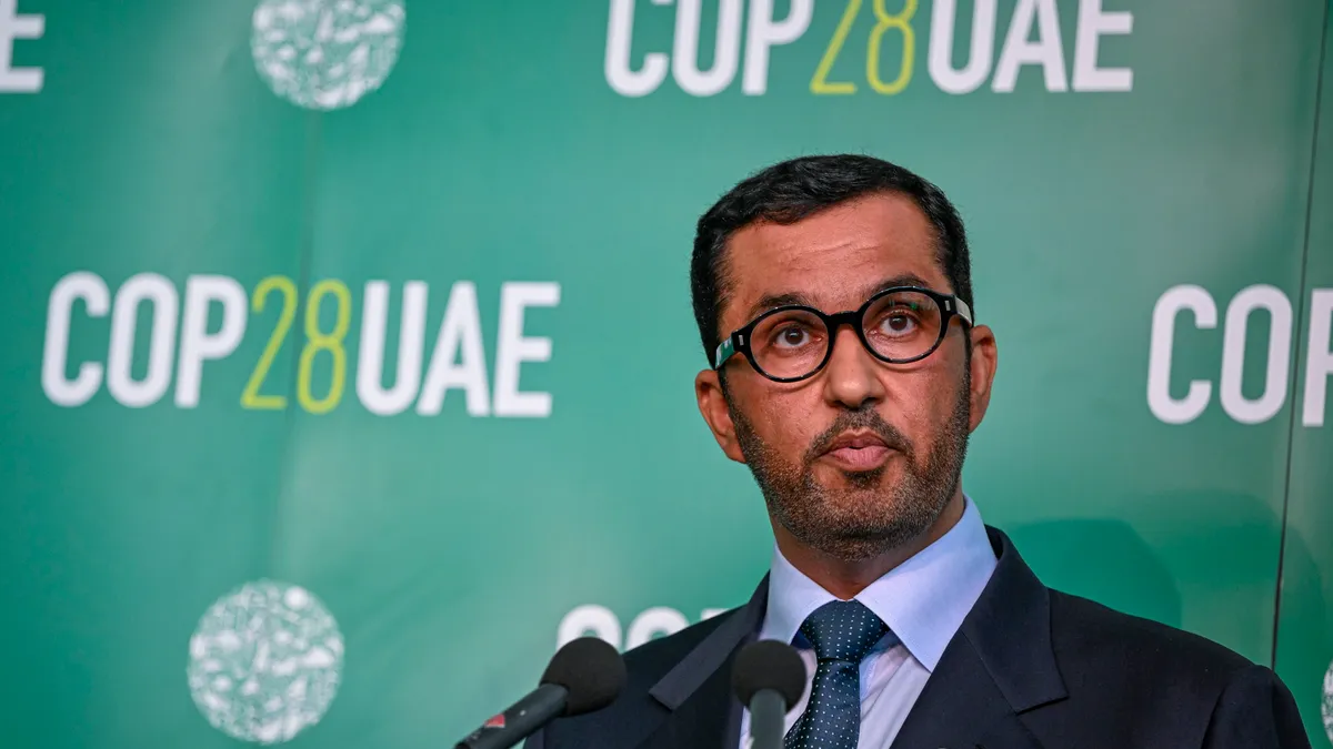 Sultan Ahmed Al Jaber speaks at a climate change conference.