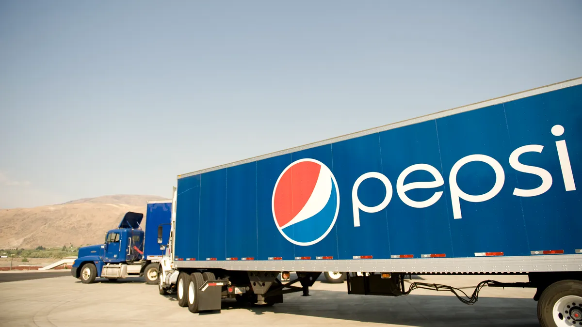 Pepsi truck heads out for delivery.