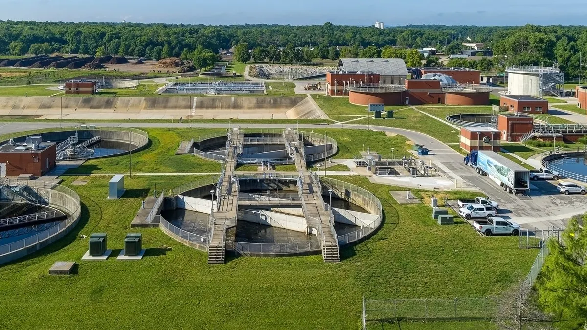 An aerial shot on a bright day of an industrial site that caters to wastewater treatment.