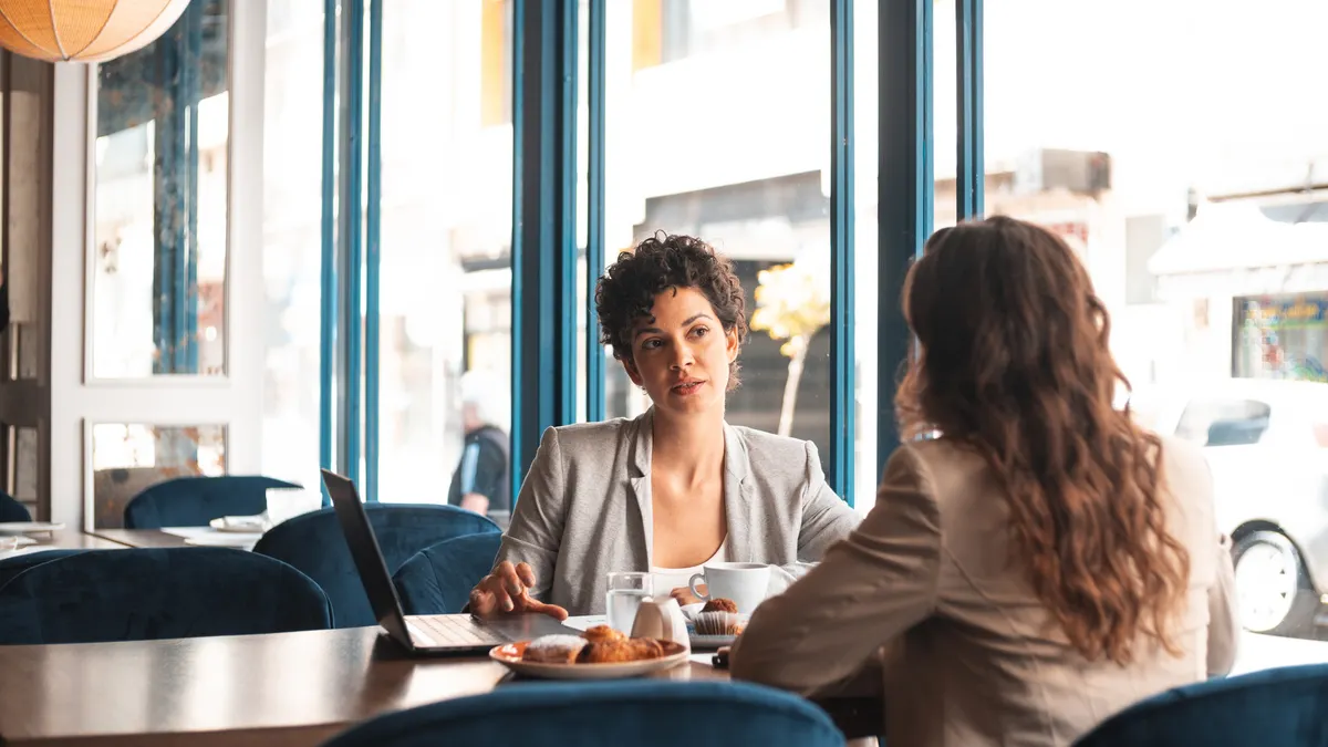 Business meeting at cafe