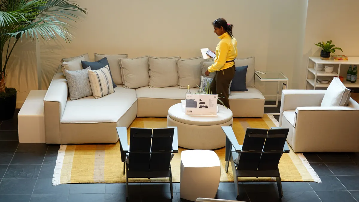 A person shops for furniture in a Room & Board store on Aug. 12, 2025, in San Francisco.