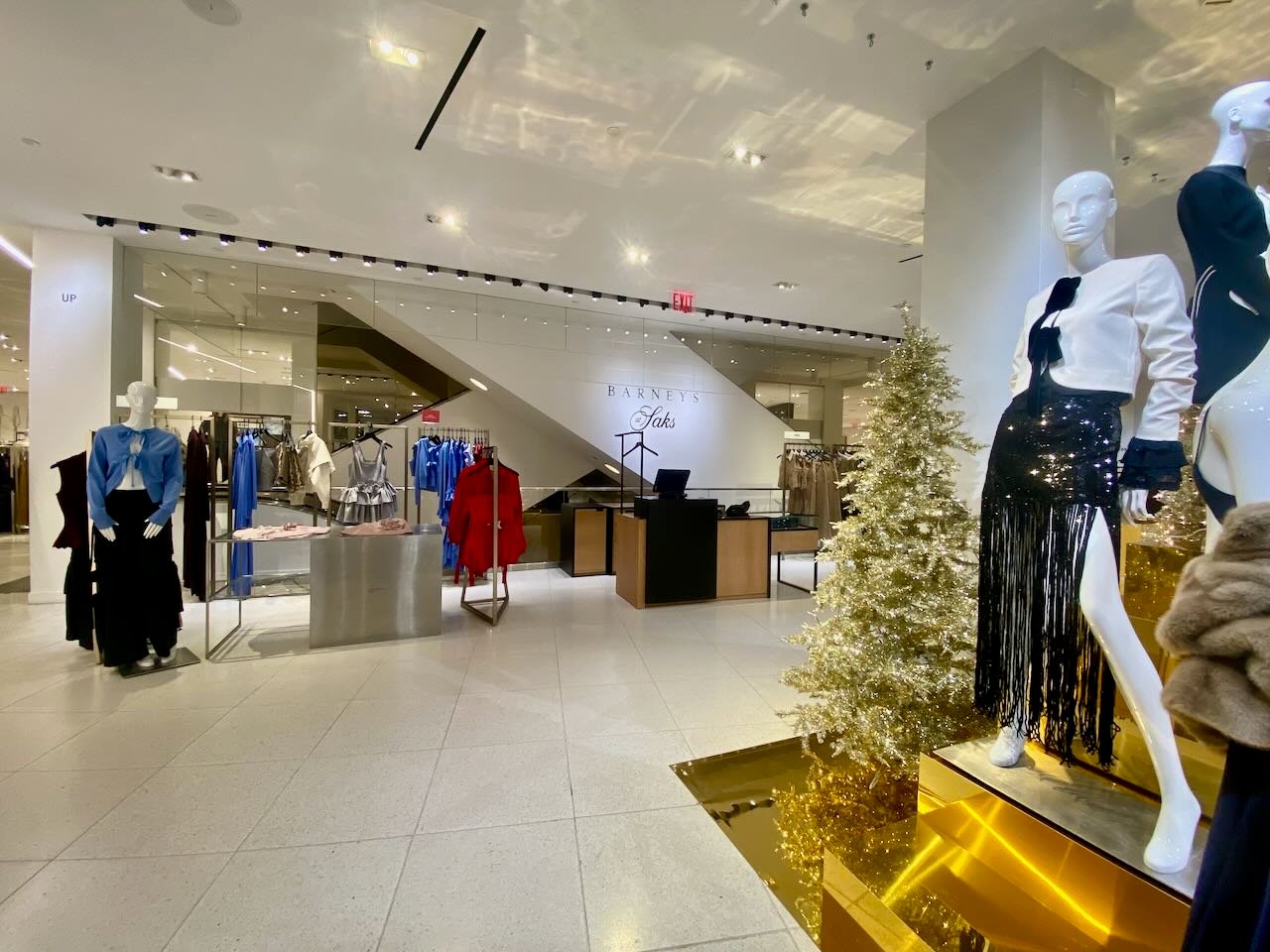 Inside a &quot;Saks at Barneys&quot; department store.