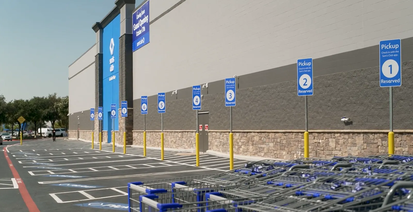 Designated pickup parking spaces outside a store.